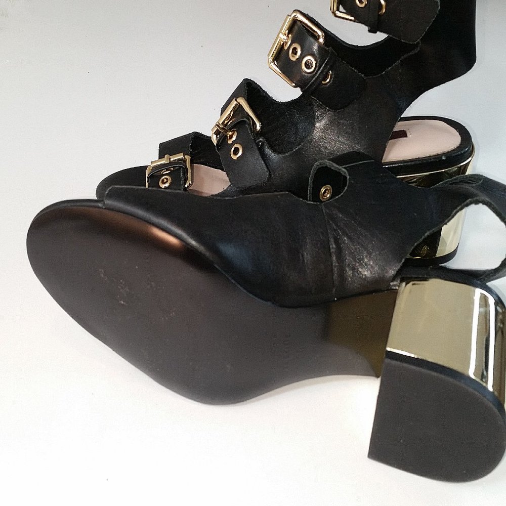 UTERQUE - Gladiator Beauties-Black Leather Straps/Gold Heel Sandals,  Size 5.5